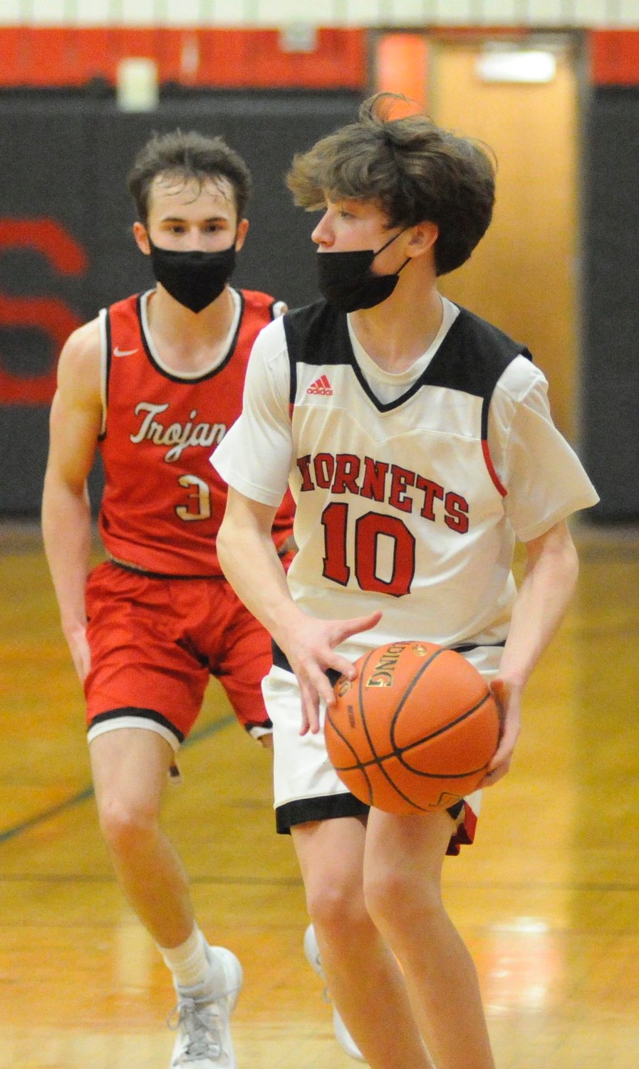 Searching for a score. Honesdale’s junior guard Karter Kromko scored 9 points, all 3-pointers. He is challenged on the court by North Pocano’s Zack Walsh, who posted 12 points, including two 3-pointers.